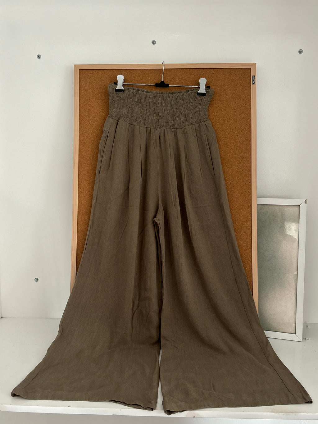 Green linen trousers