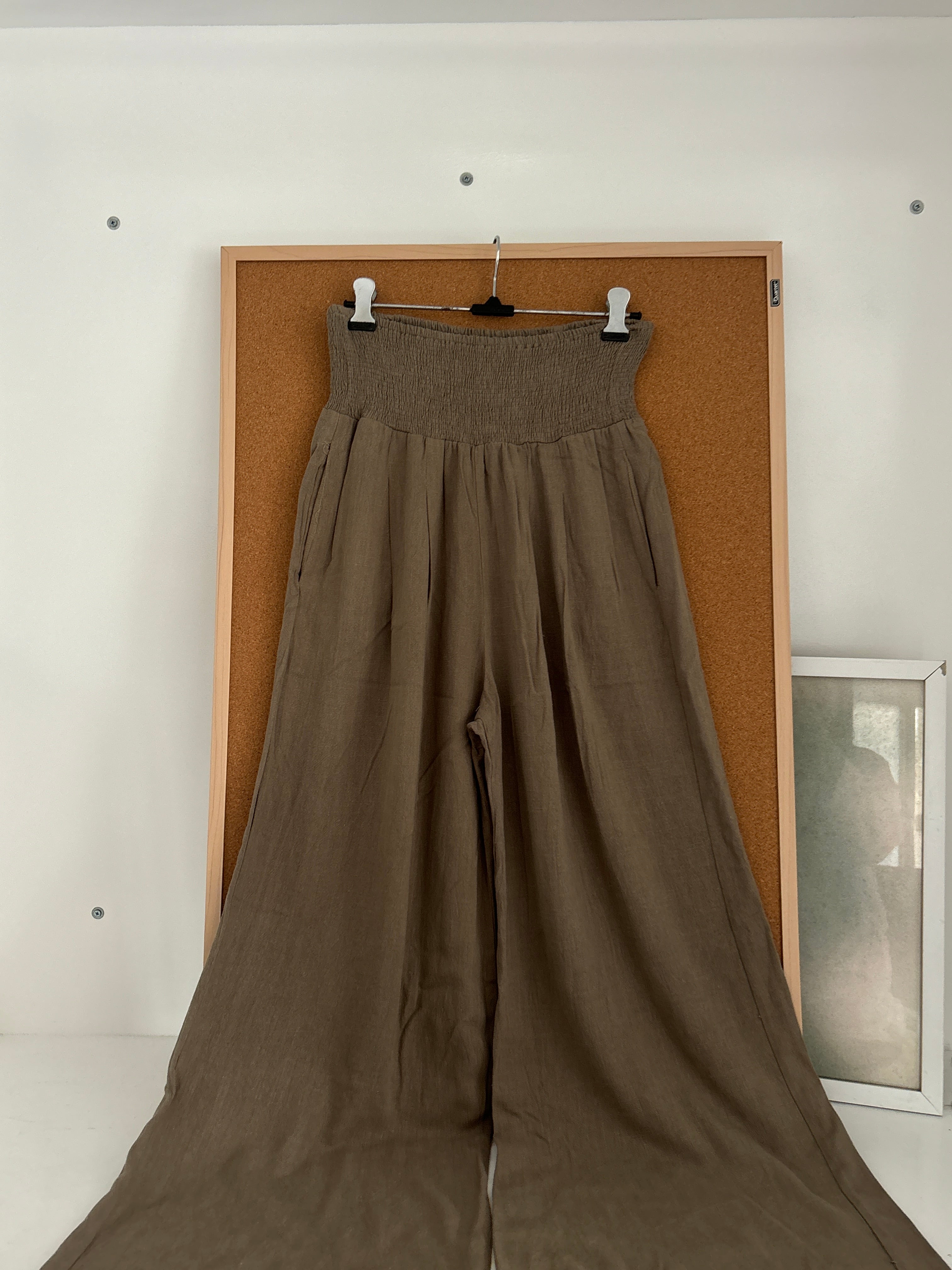 Green linen trousers