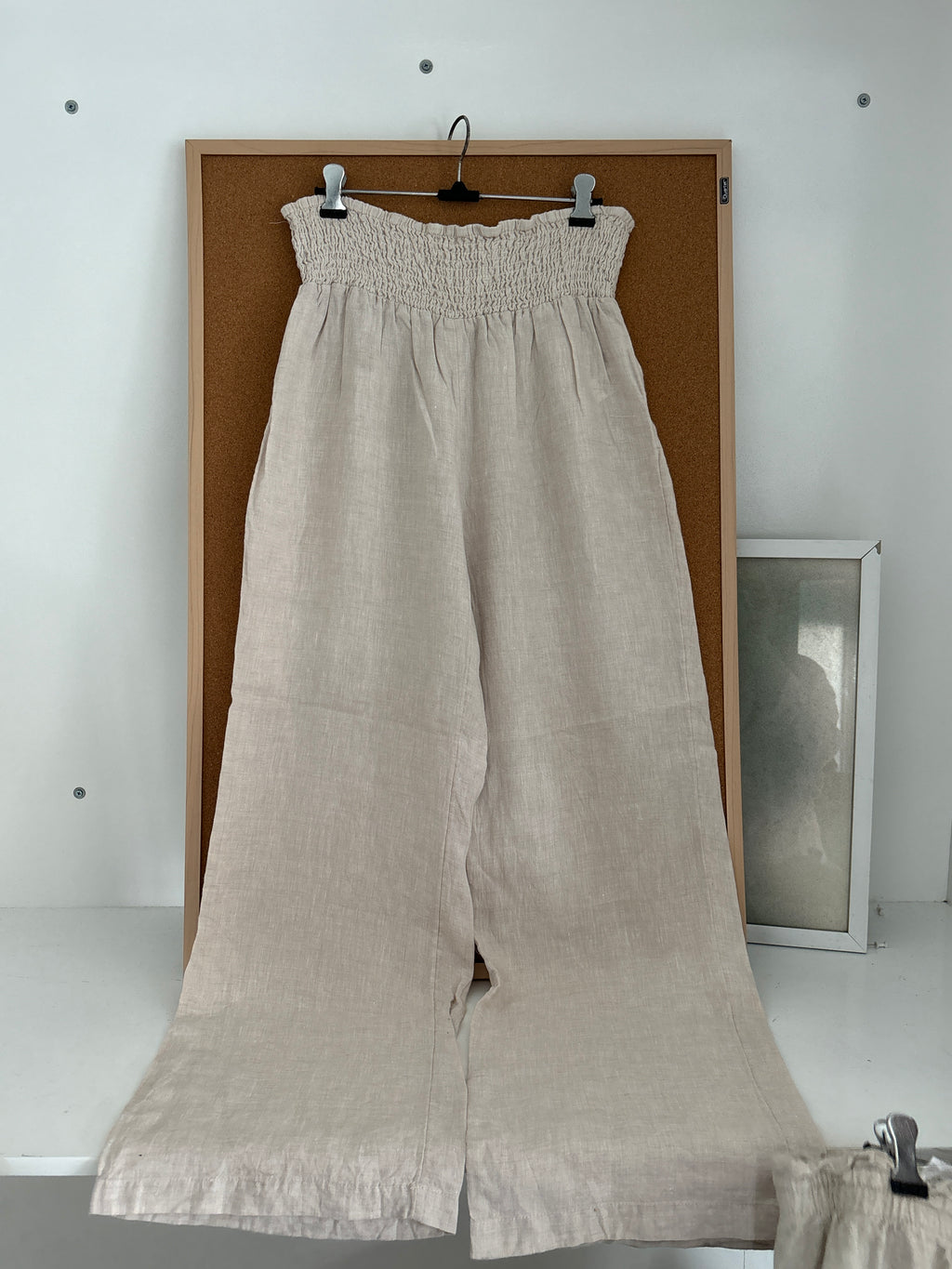 Beige linen trousers