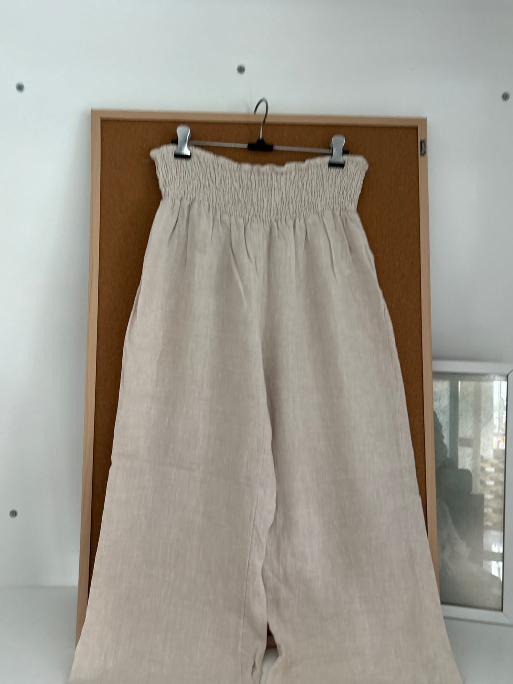 Beige linen trousers