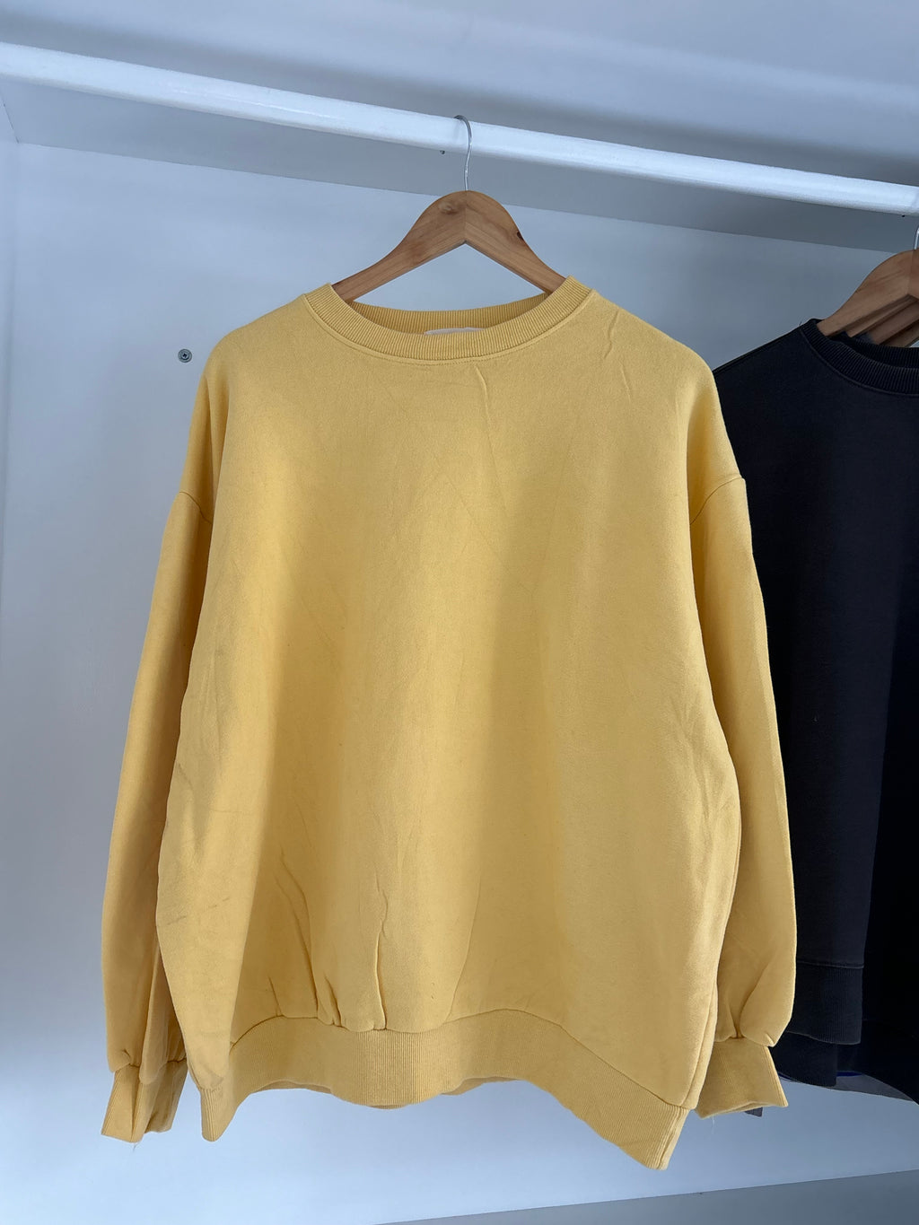 Yellow solid sweatshirt.