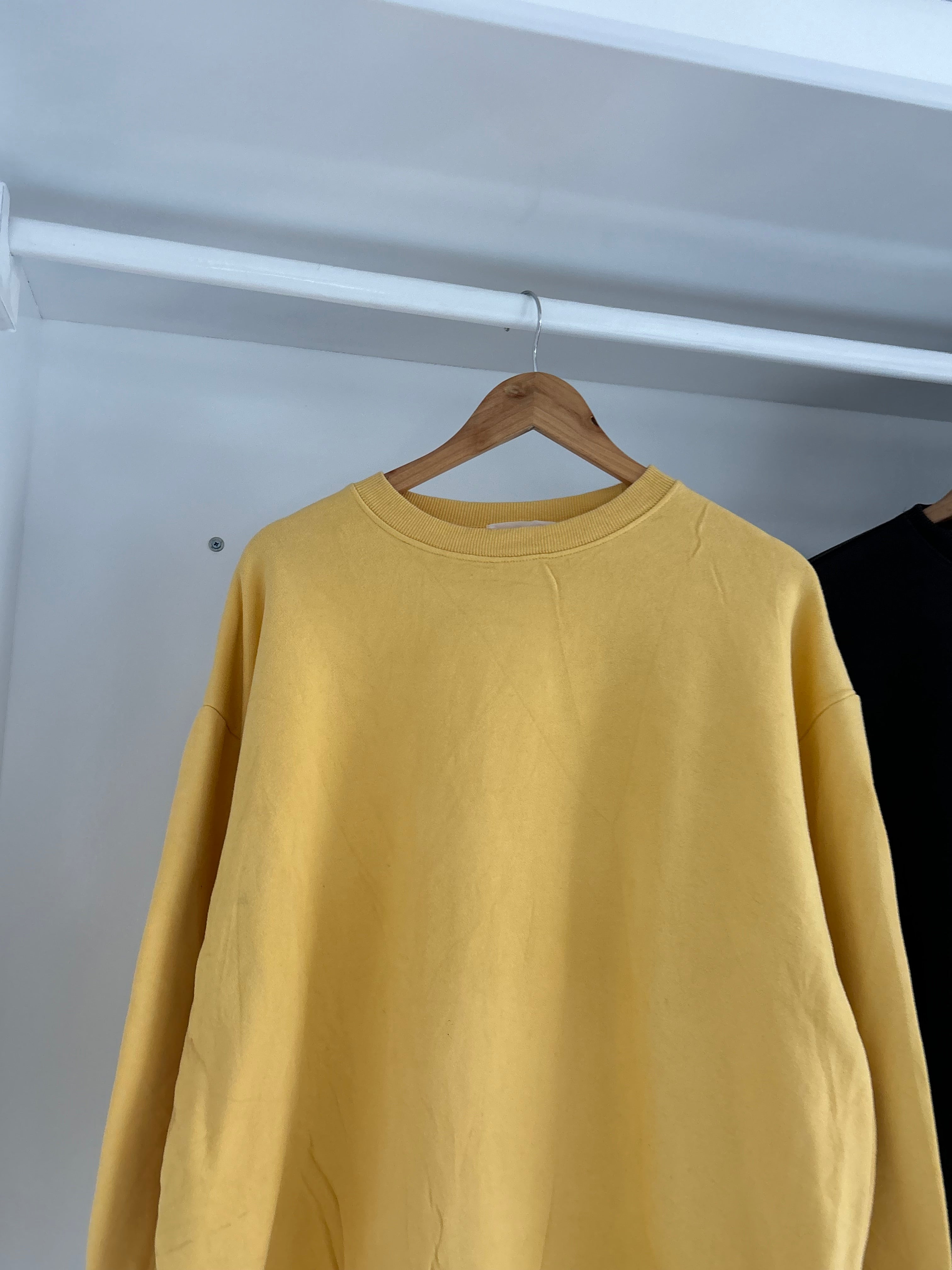 Yellow solid sweatshirt.
