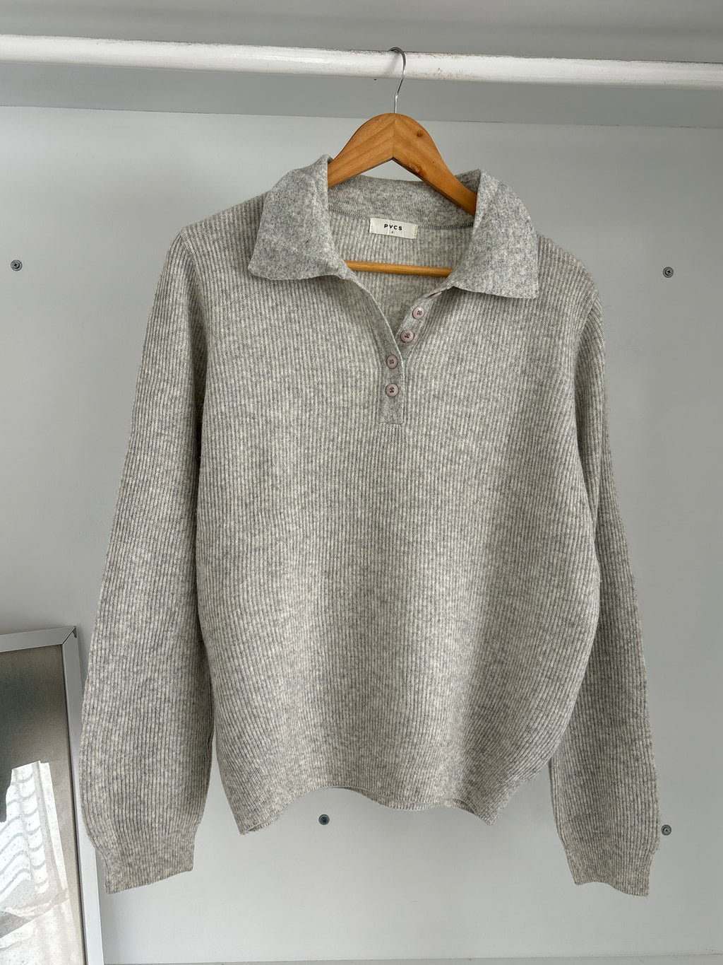 Half-buttoned sweater