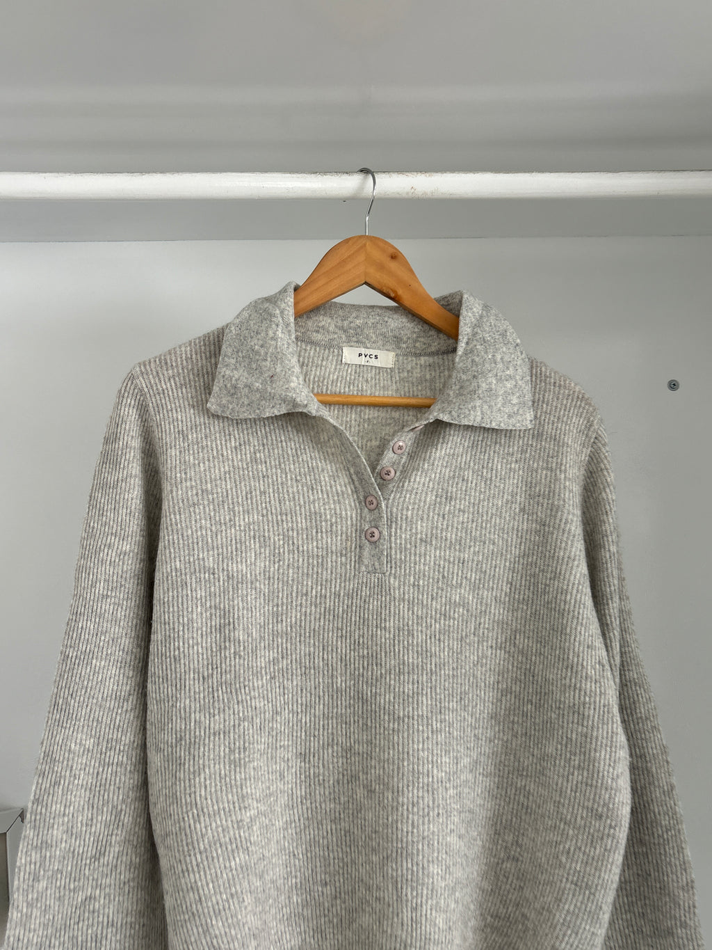 Half-buttoned sweater