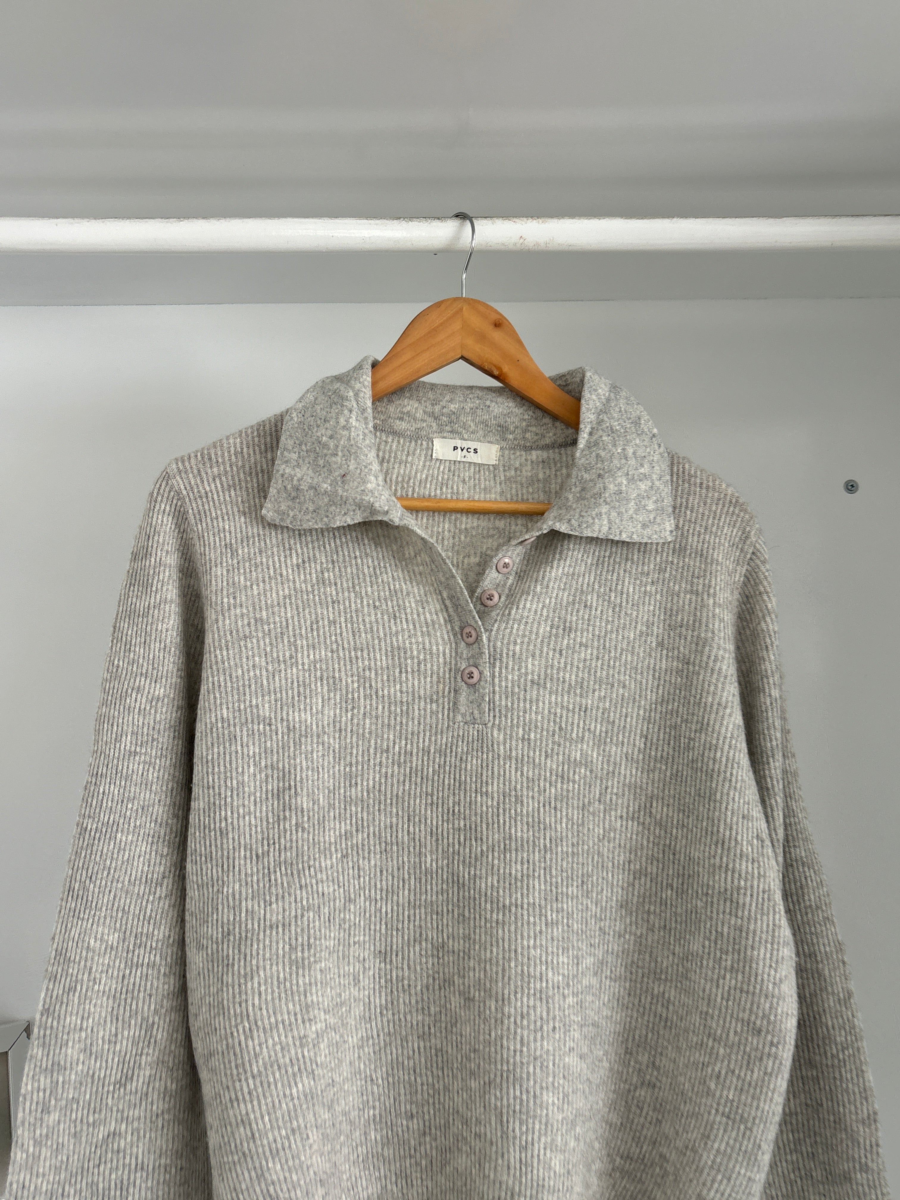 Half-buttoned sweater