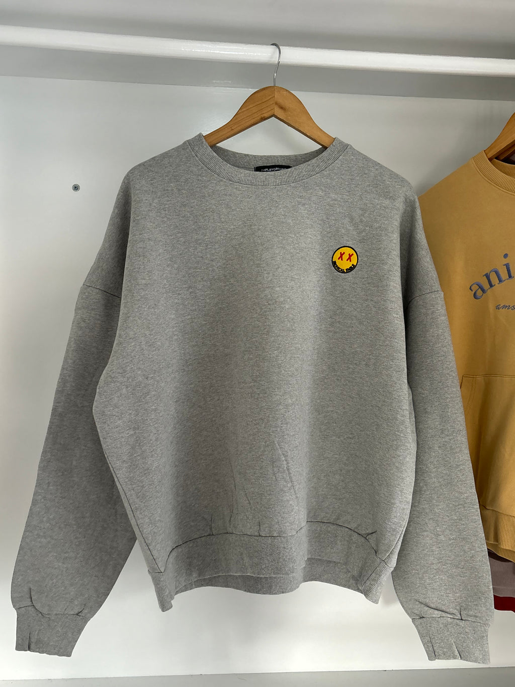 Smiley sweatshirt.
