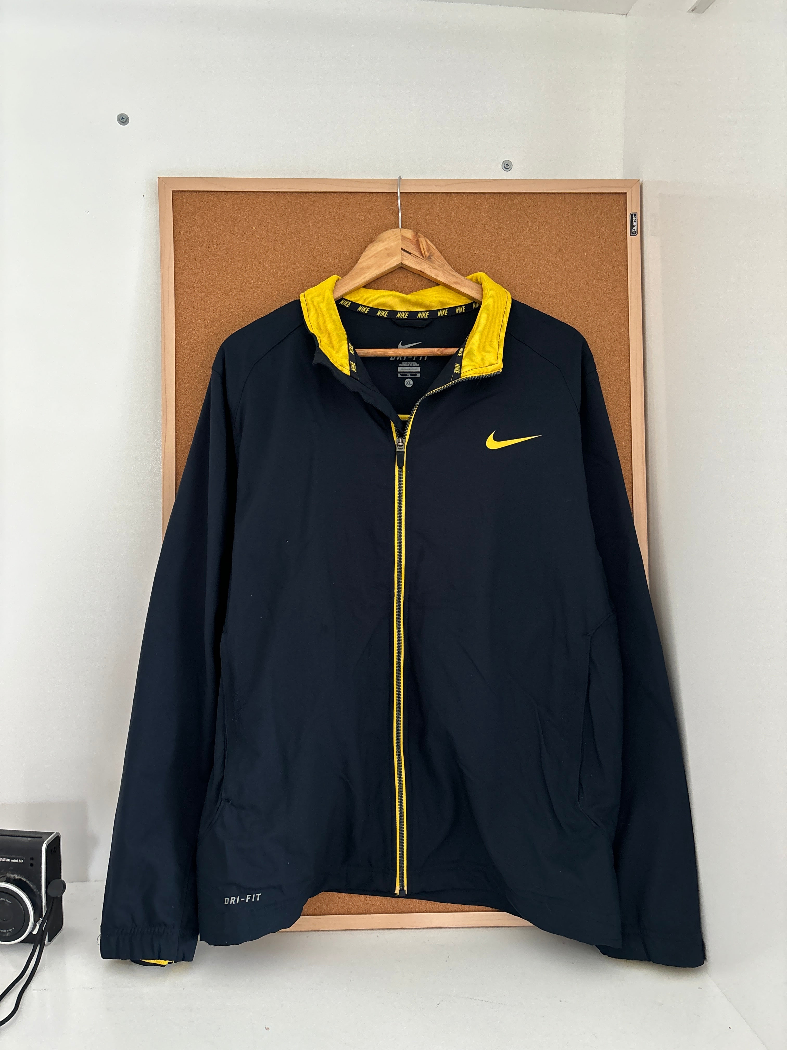 Nike Dri-FIT black athletic jacket