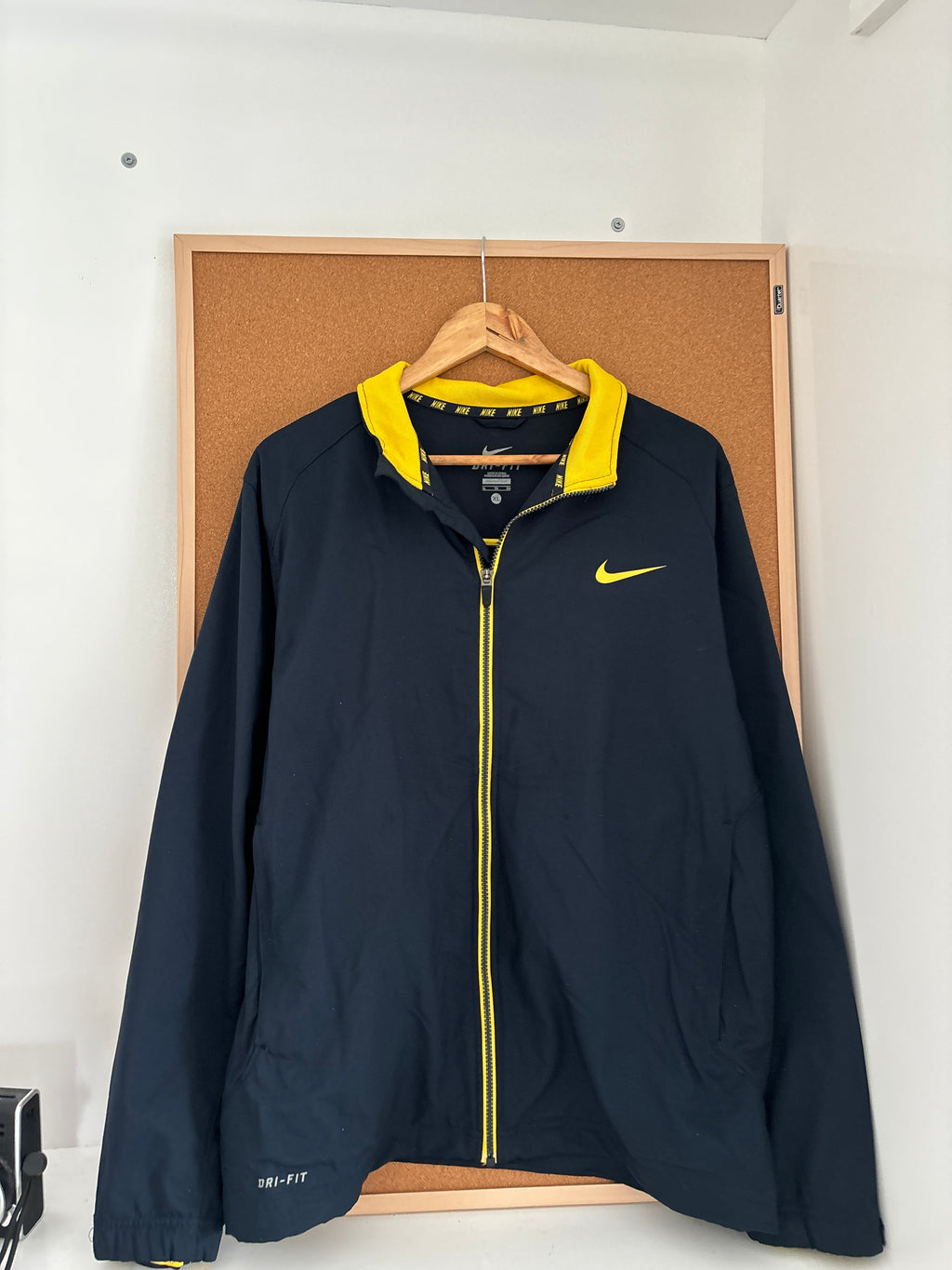 Nike Dri-FIT black athletic jacket