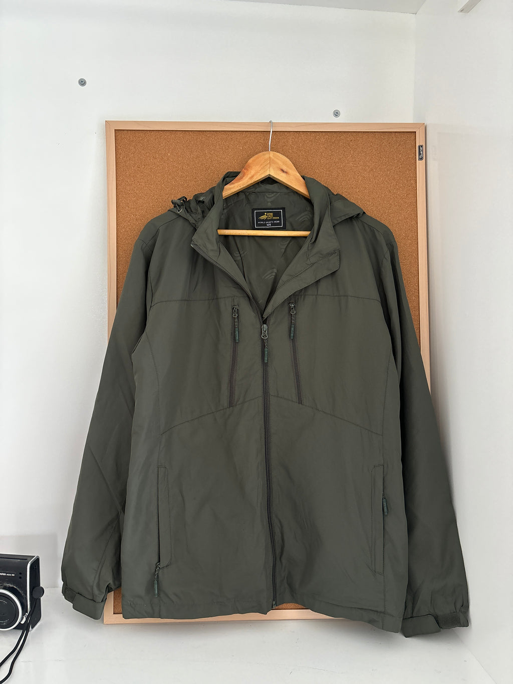olive green outdoor hooded jacket