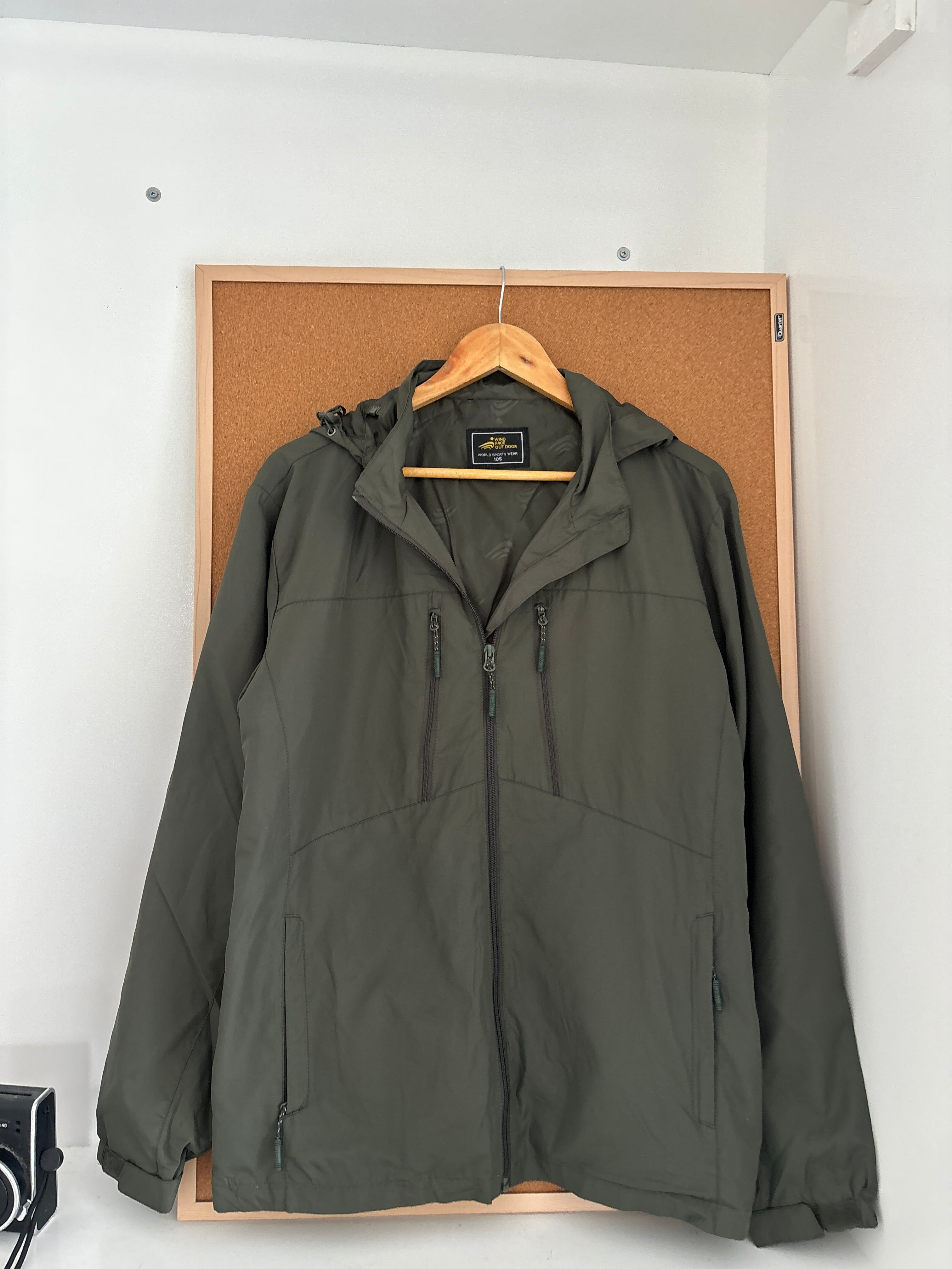 olive green outdoor hooded jacket