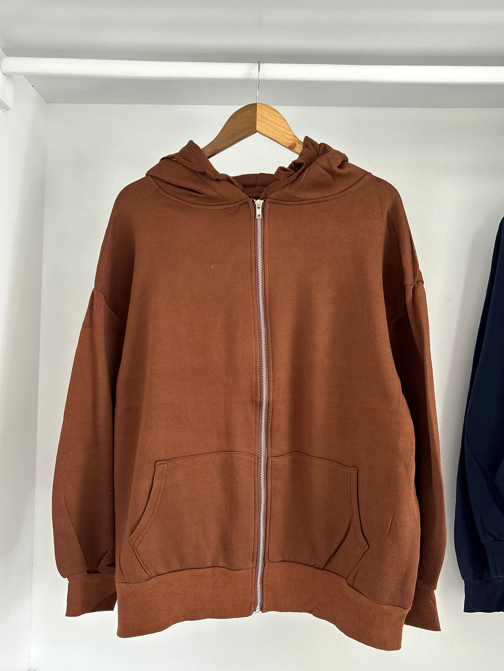 Brown zipper hoodie.