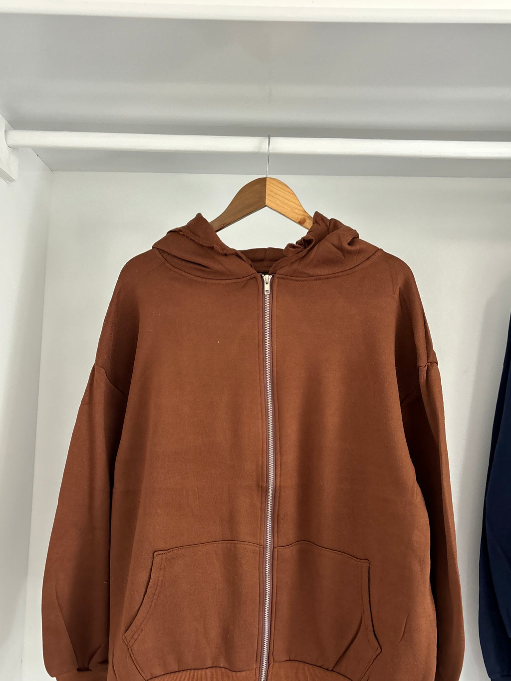 Brown zipper hoodie.