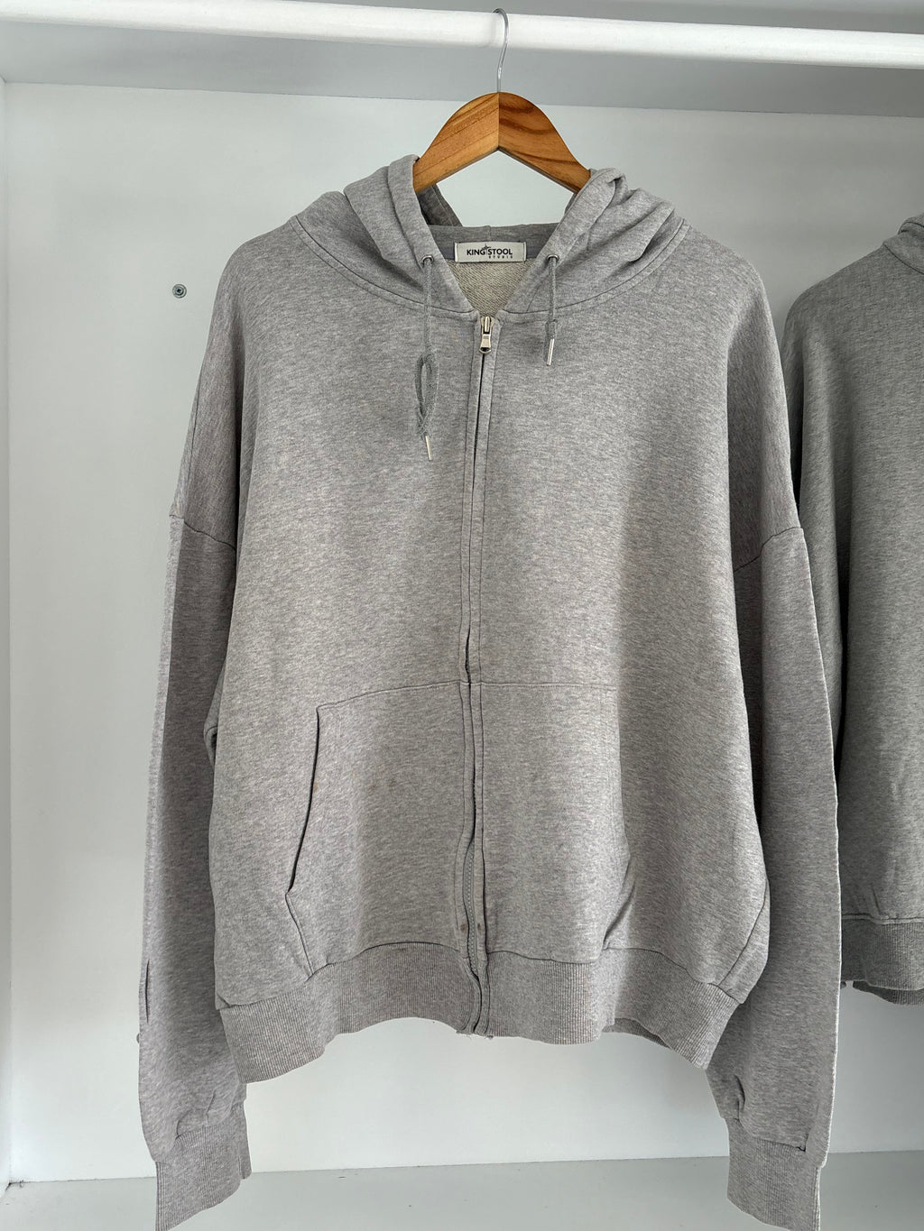 Grey hoodie.