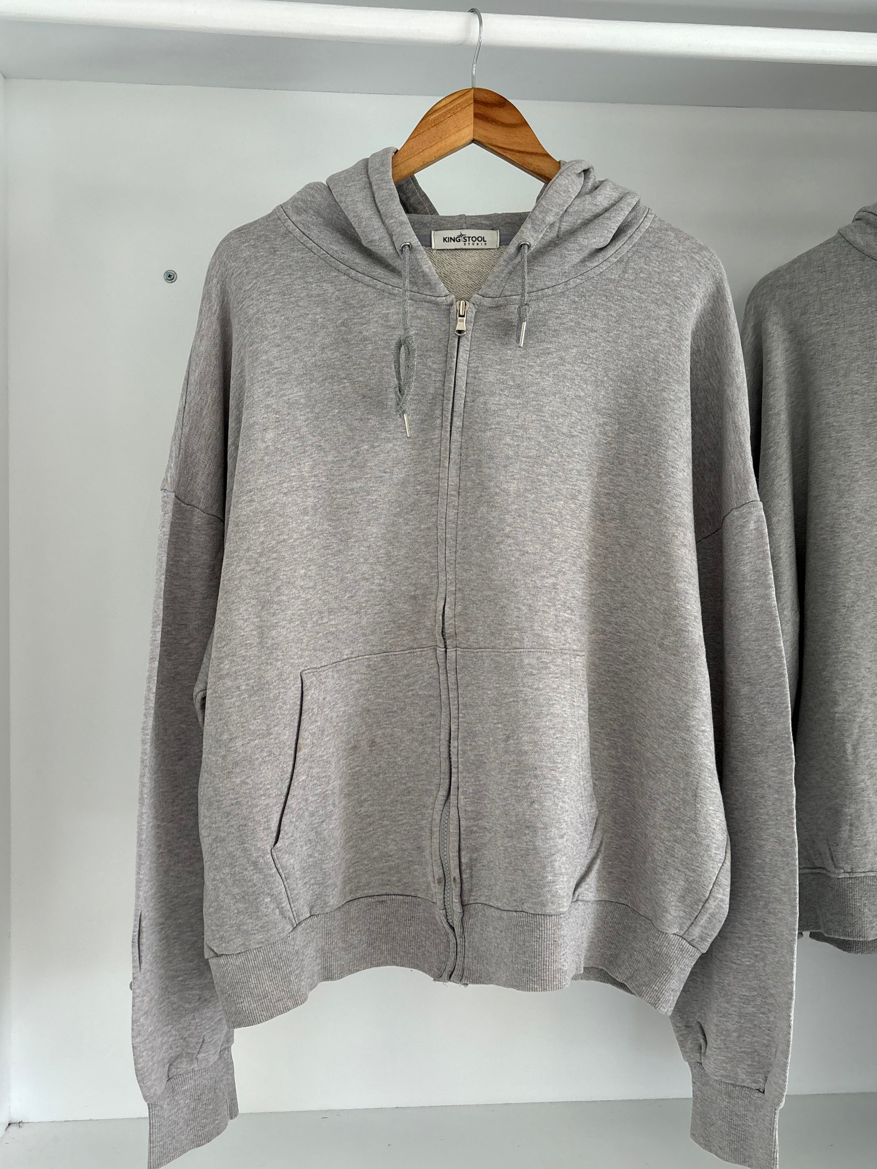 Grey hoodie.