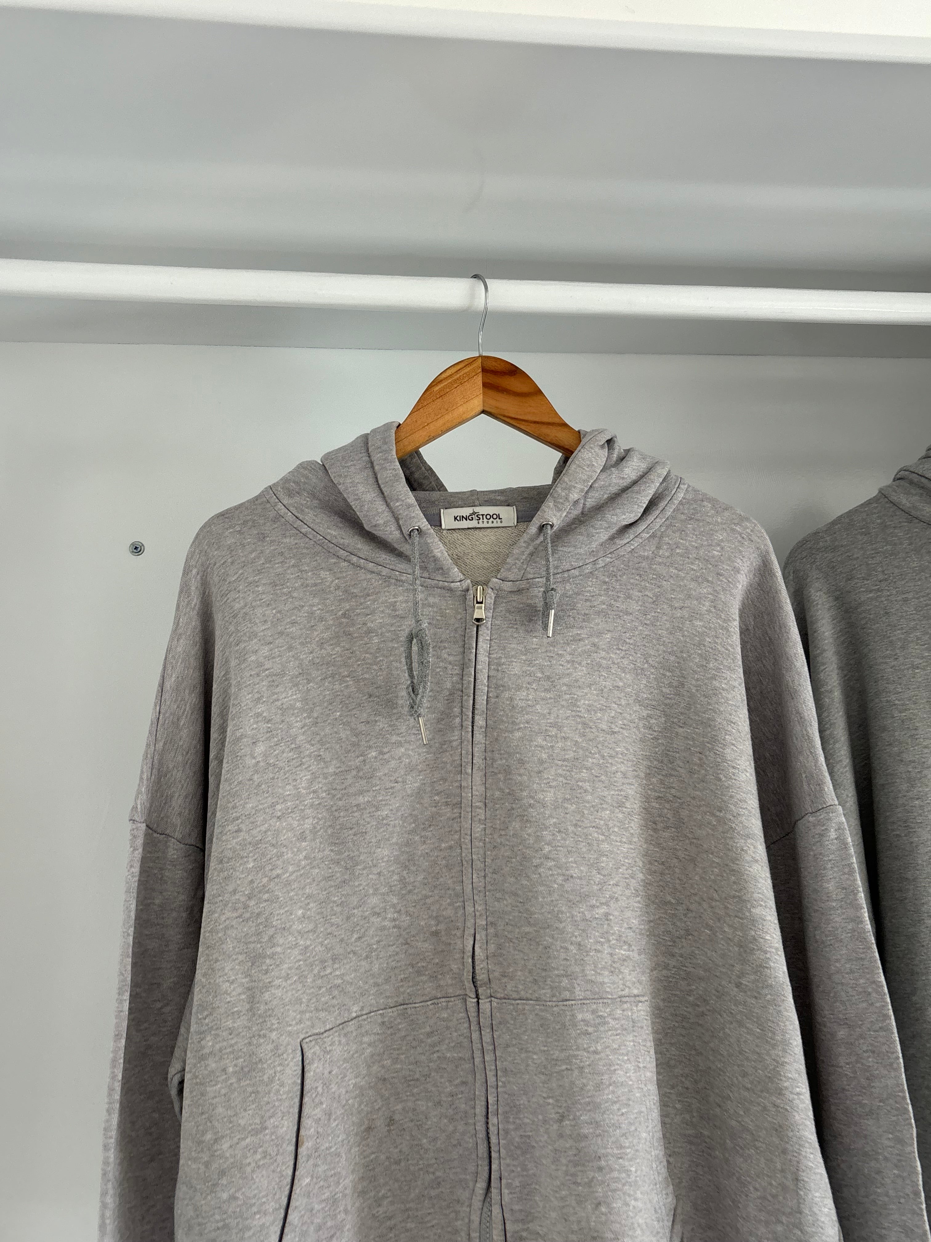 Grey hoodie.