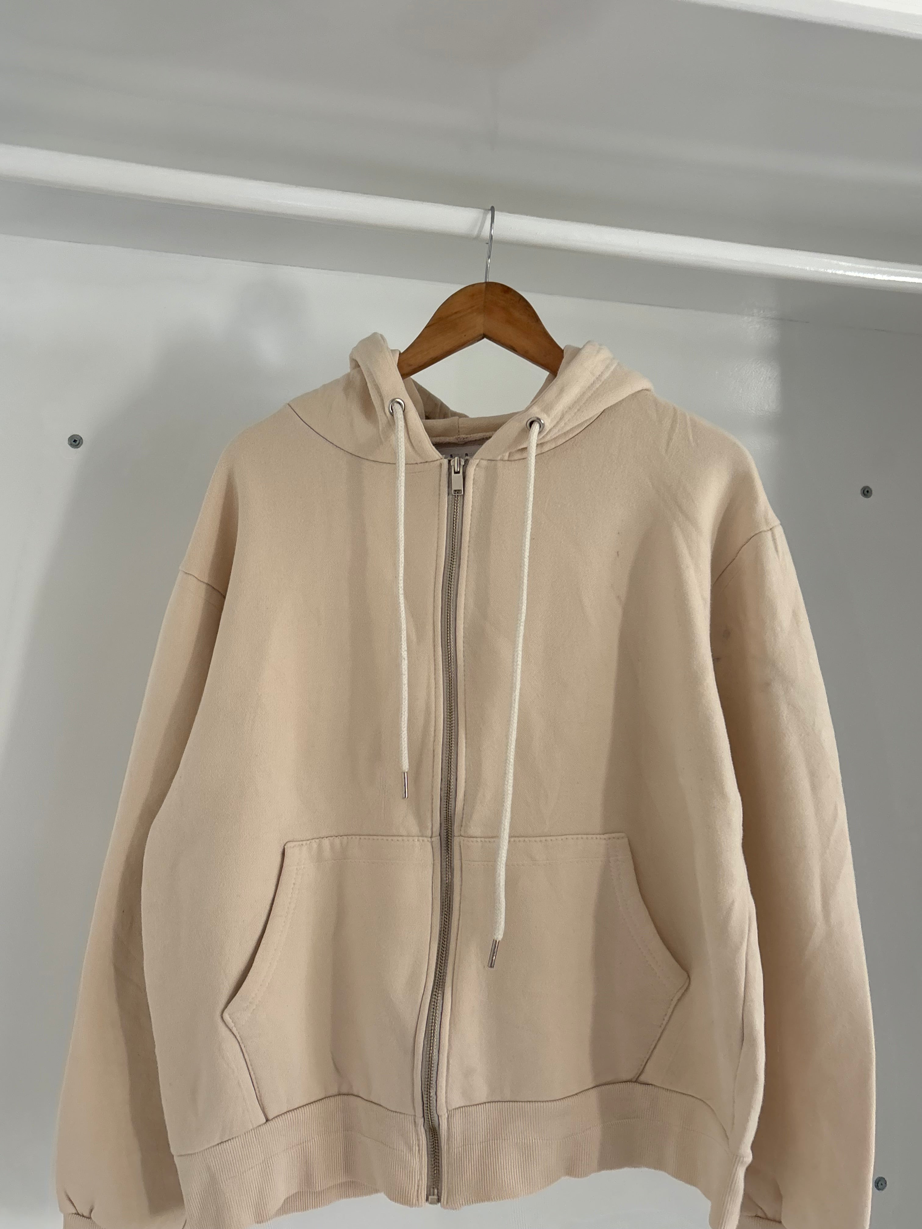 Beige zipper hoodie.