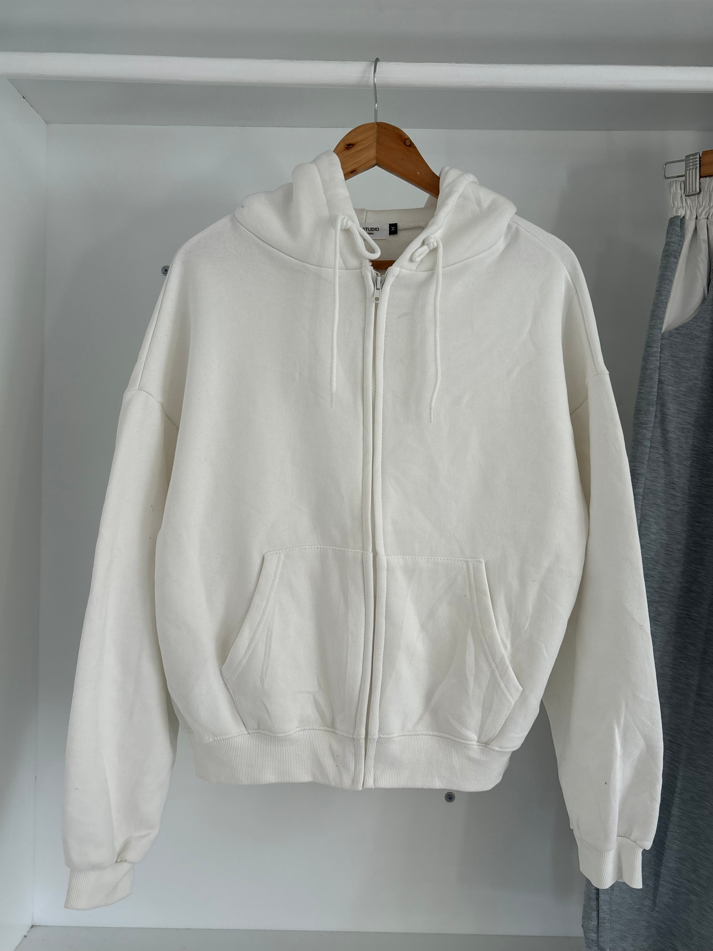 White zipper hoodie.