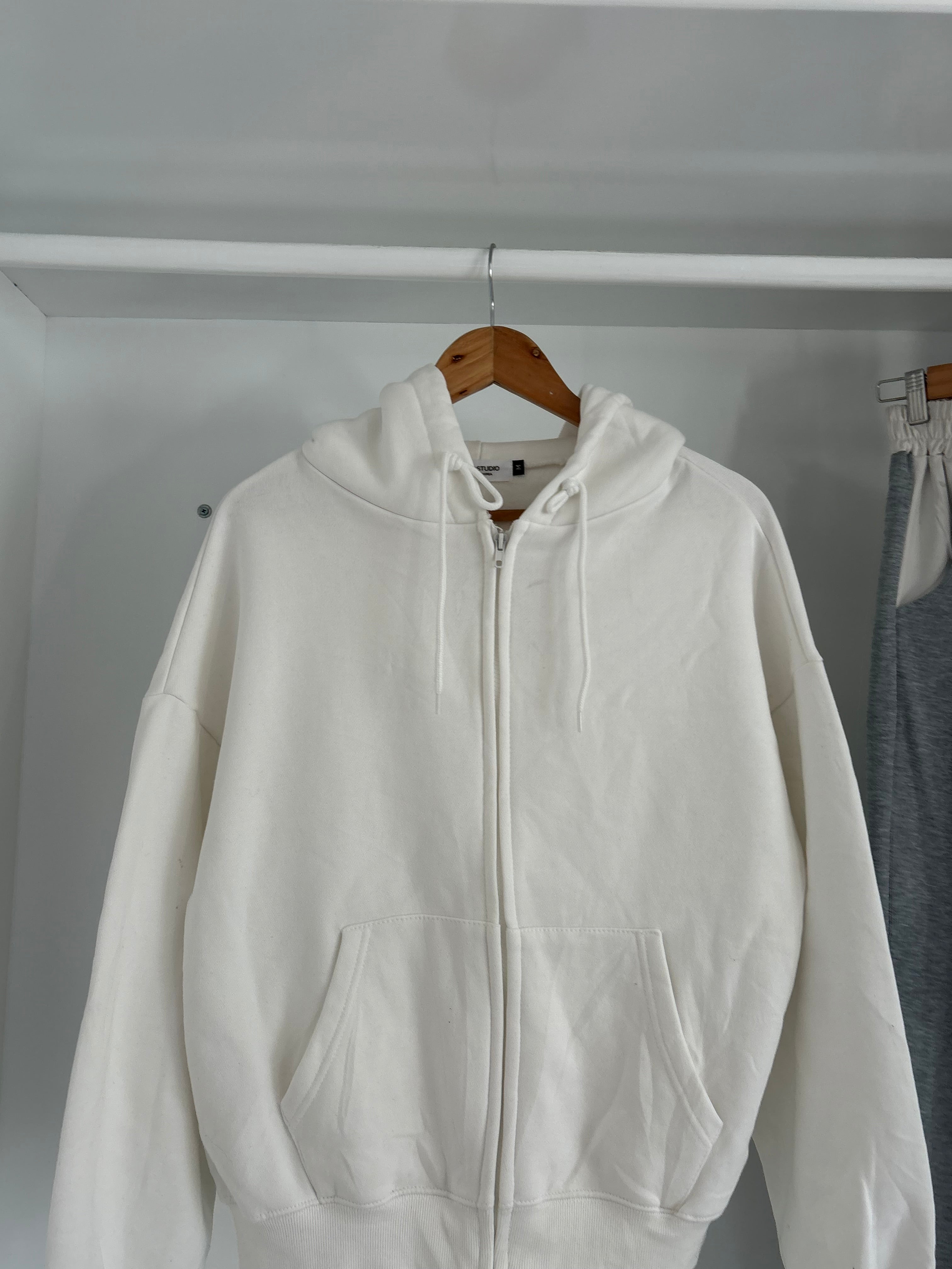 White zipper hoodie.