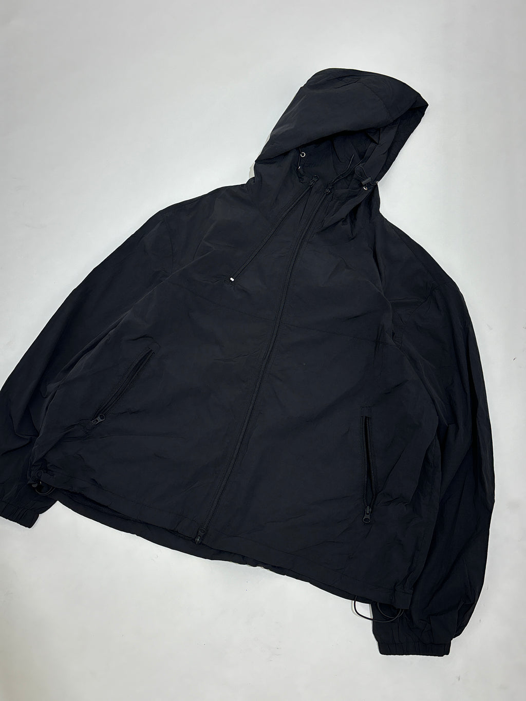 Black windbreaker