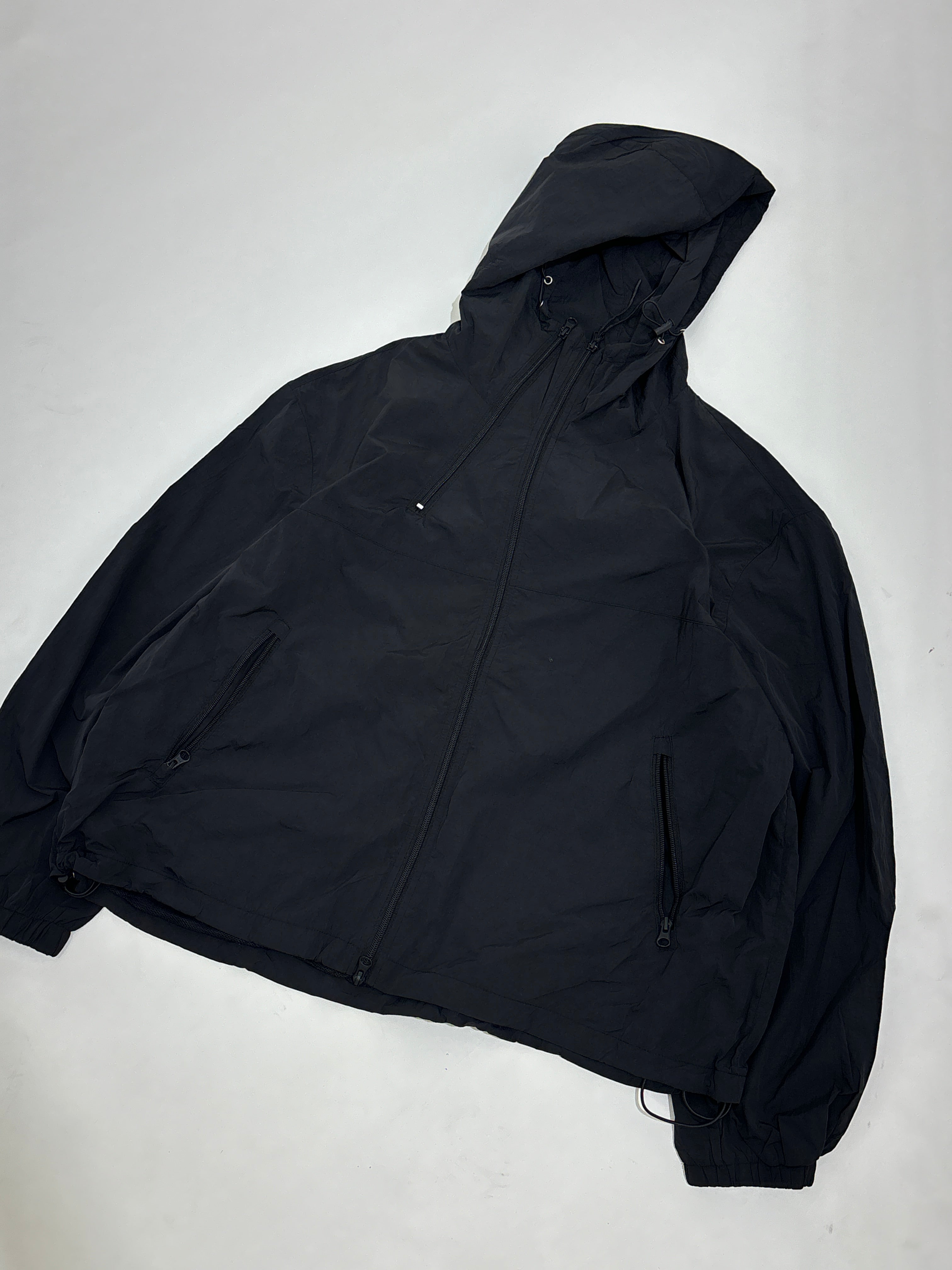 Black windbreaker