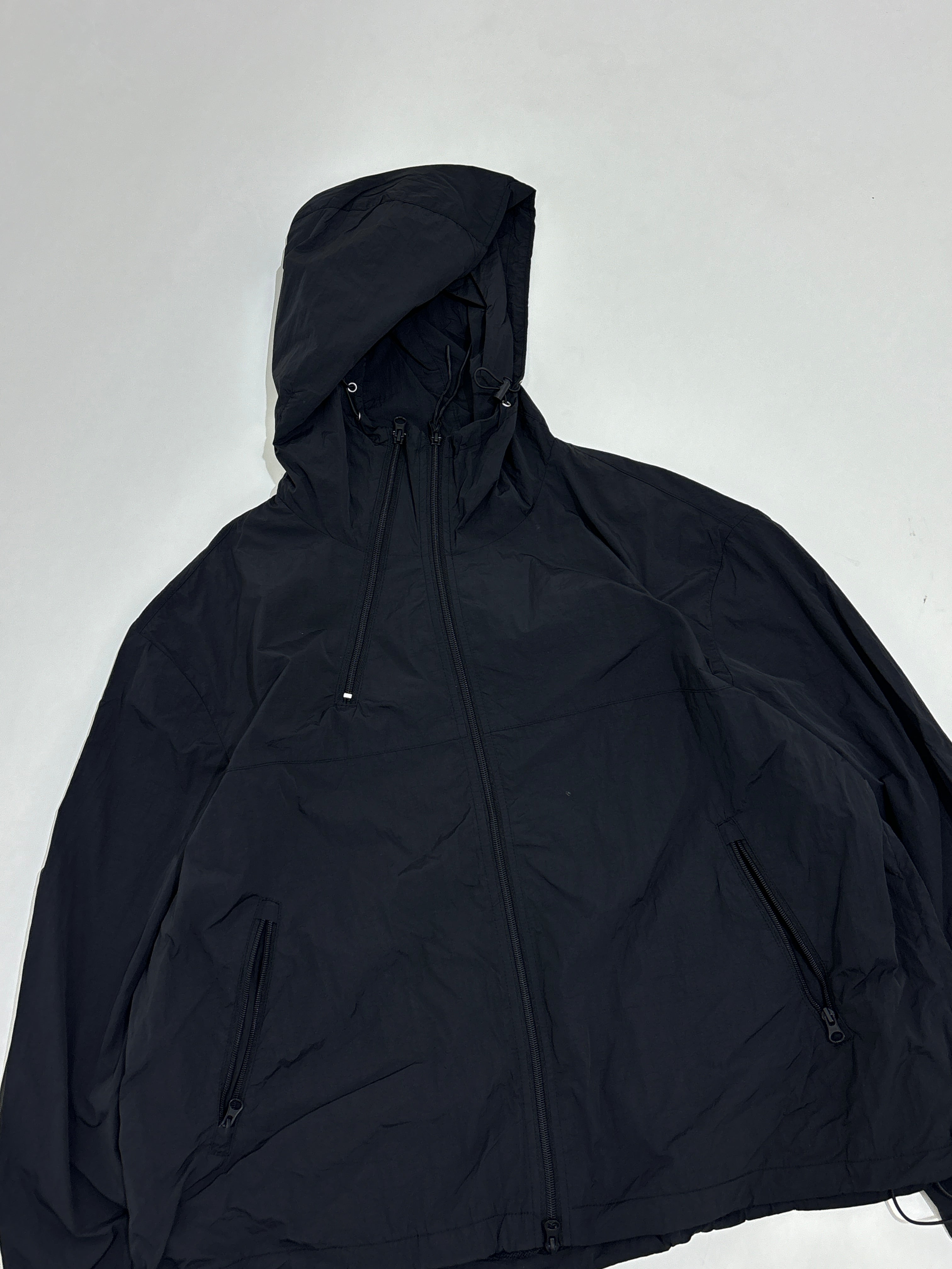 Black windbreaker