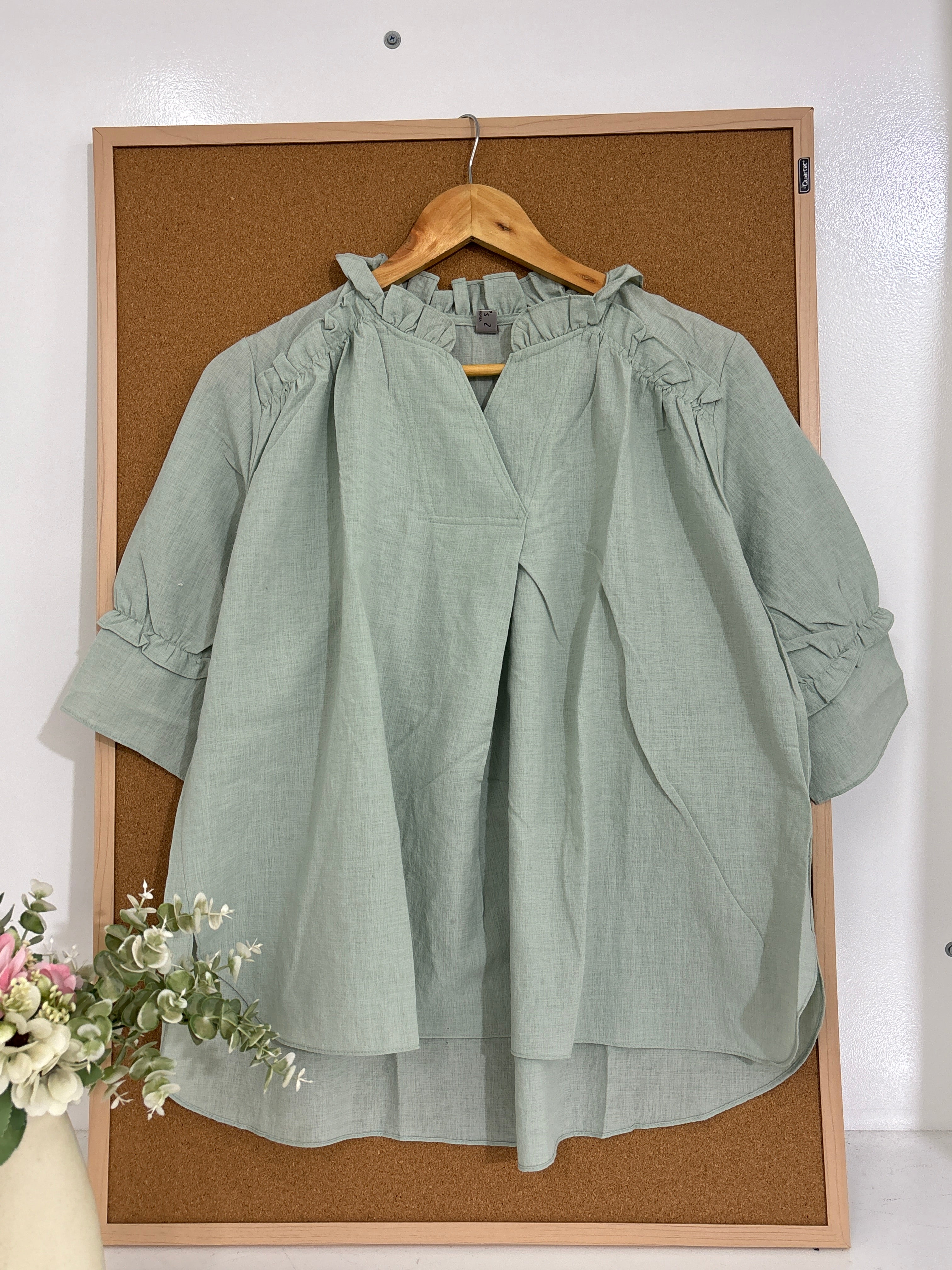 Green tunic