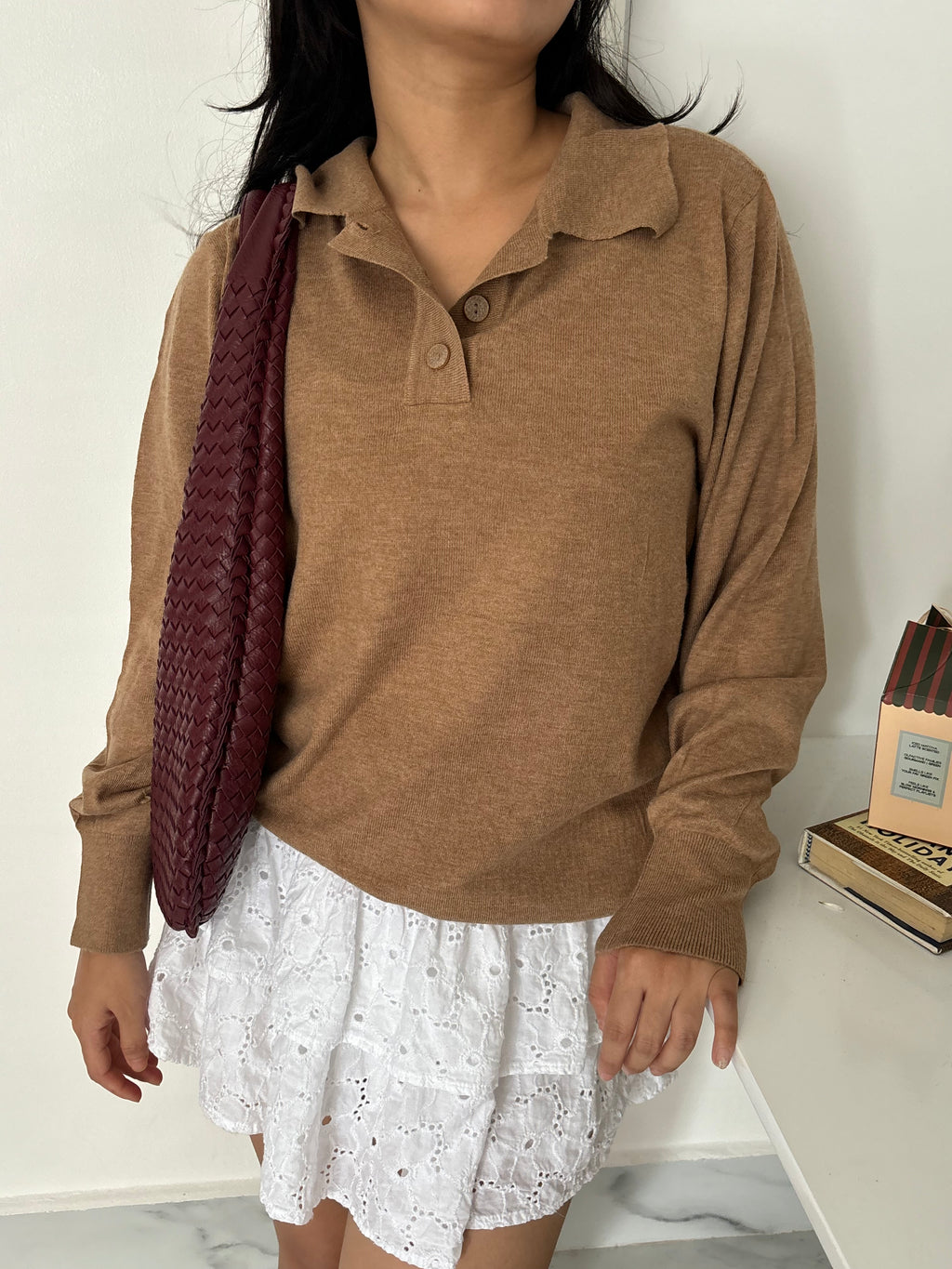 Half buttoned Sweater.