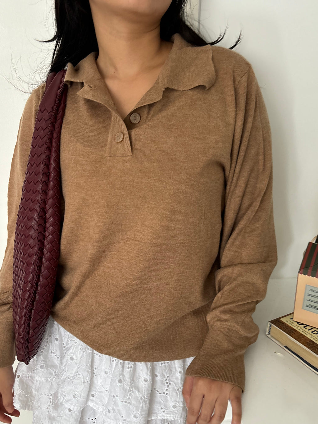 Half buttoned Sweater.